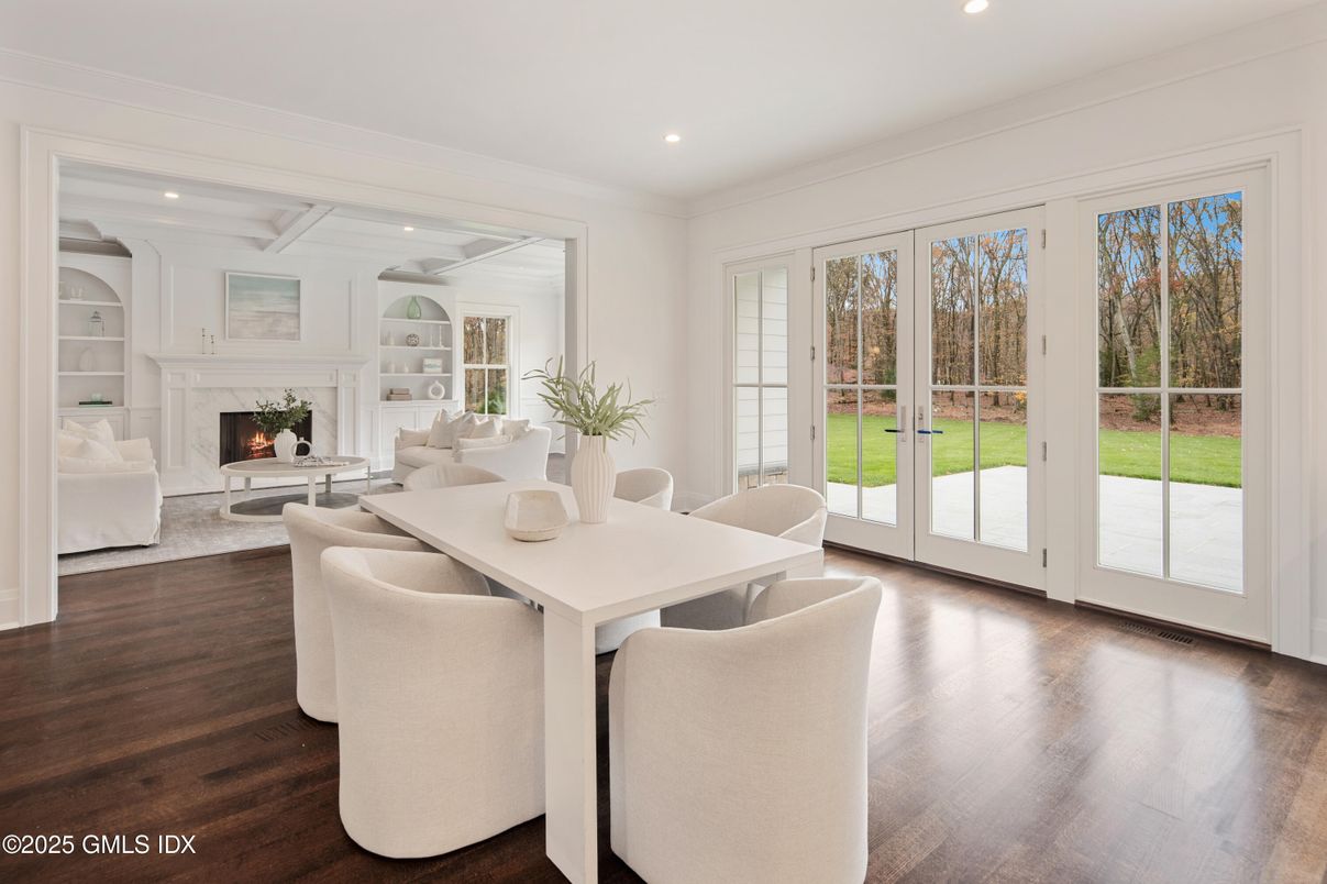 Dining room, Fireplace, Interior, Living room, Recessed Lighting, Wood Texture Flooring