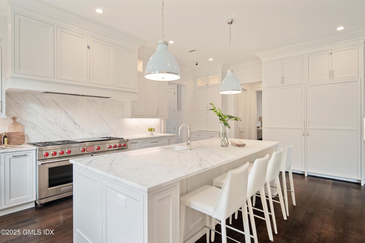 Interior, Kitchen, Marble Walls, Pendant Lights, Recessed Lighting, Stainless Steel Appliances, Wood Texture Flooring