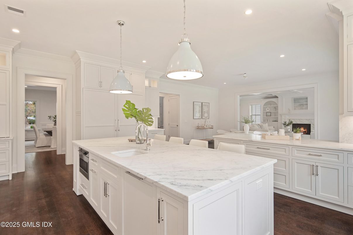 Dining room, Fireplace, Interior, Kitchen, Pendant Lights, Recessed Lighting, Wood Texture Flooring