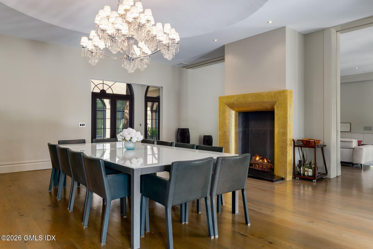 Chandelier, Dining room, Fireplace, Interior, Recessed Lighting, Wood Texture Flooring