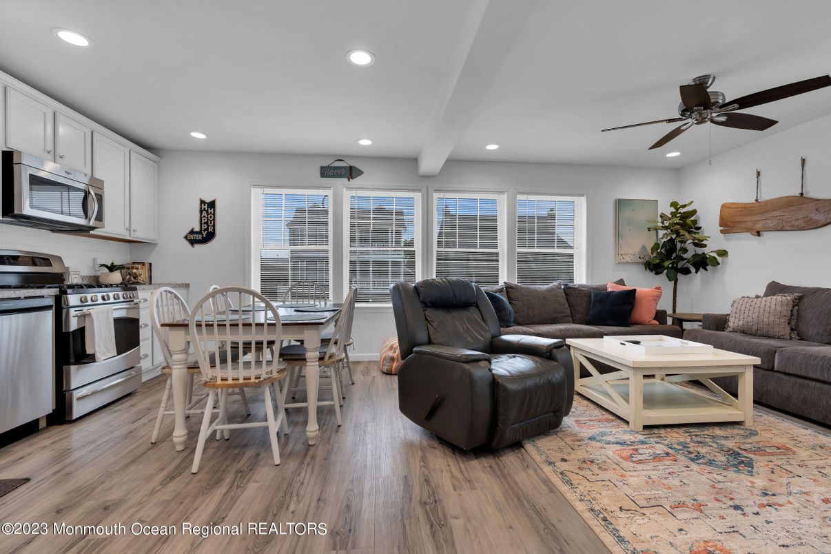 Dining room, Interior, Kitchen, Living room, Recessed Lighting, Stainless Steel Appliances, Wood Texture Flooring
