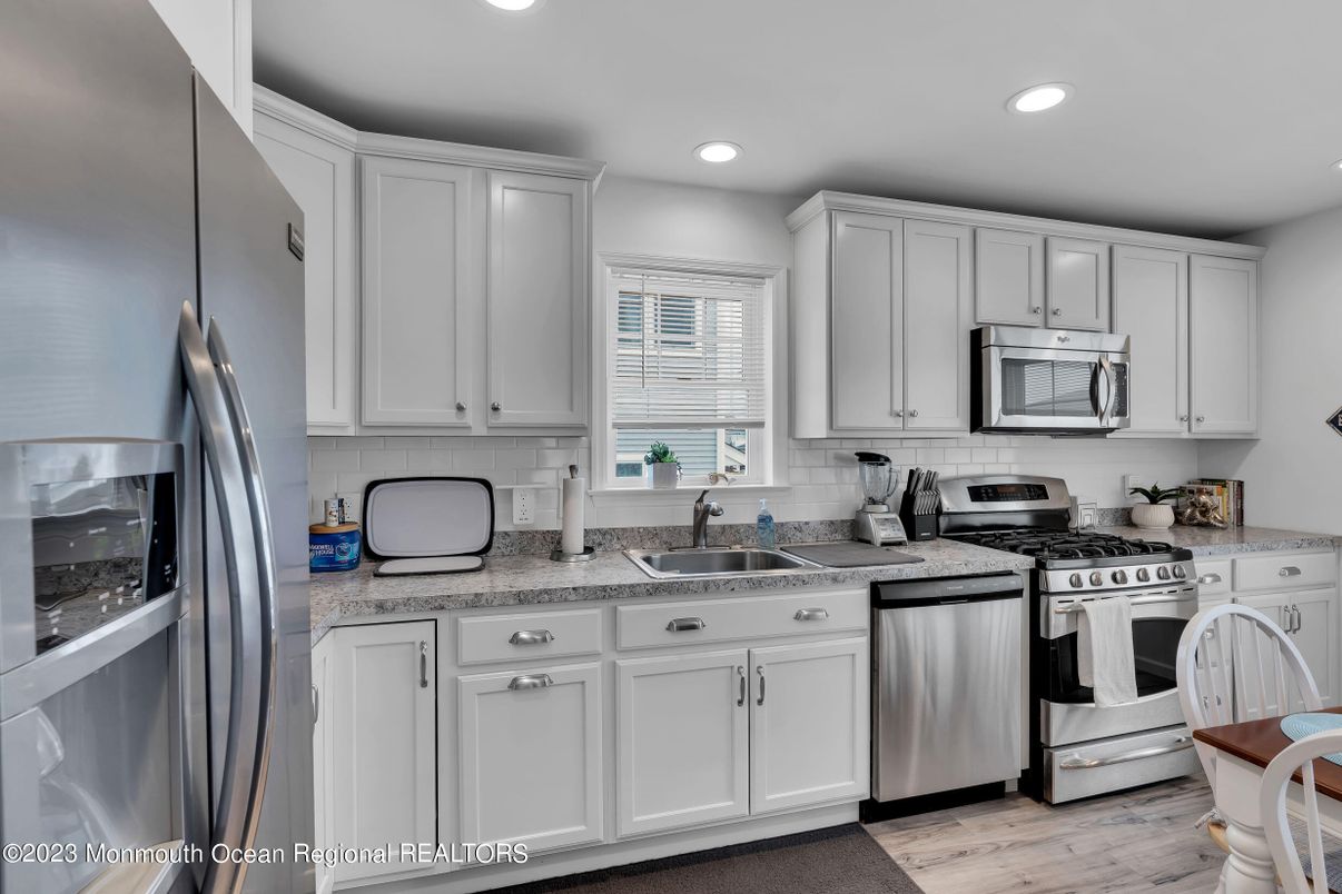 Interior, Kitchen, Recessed Lighting, Stainless Steel Appliances, Wood Texture Flooring