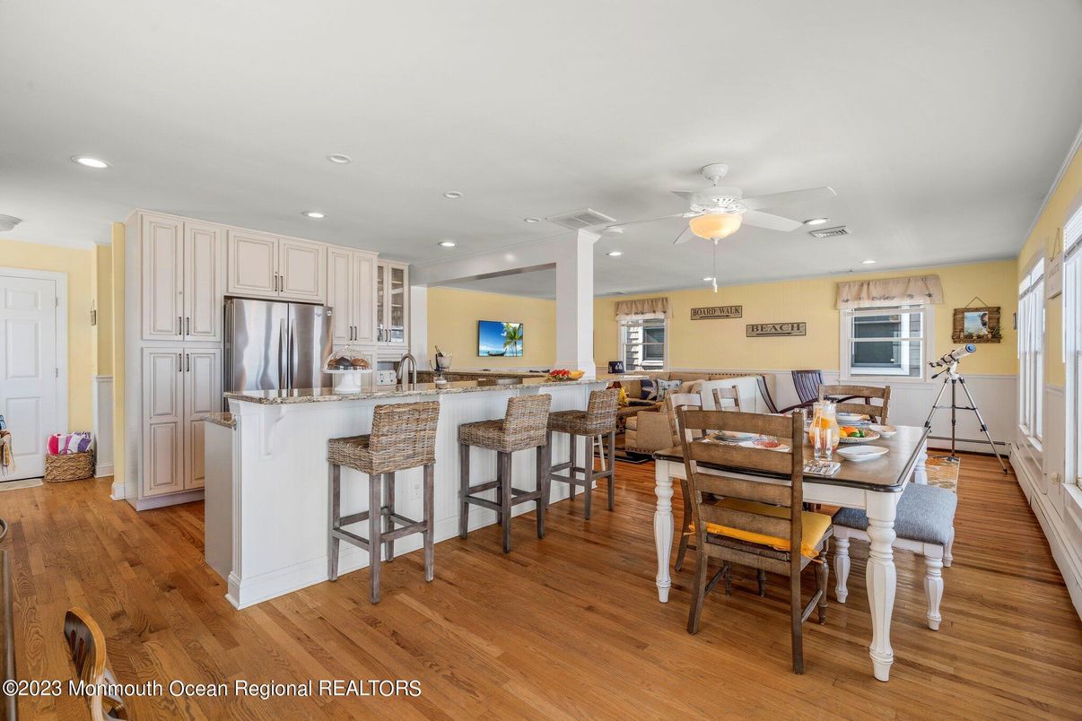 Dining room, Interior, Kitchen, Recessed Lighting, Stainless Steel Appliances, Wood Texture Flooring