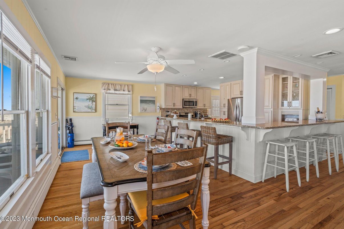 Dining room, Interior, Kitchen, Recessed Lighting, Stainless Steel Appliances, Wood Texture Flooring