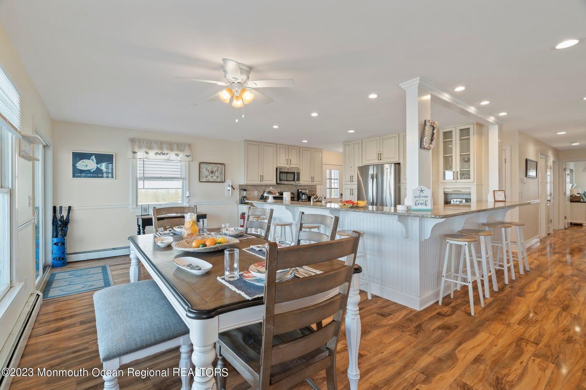 Dining room, Interior, Kitchen, Recessed Lighting, Stainless Steel Appliances, Wood Texture Flooring