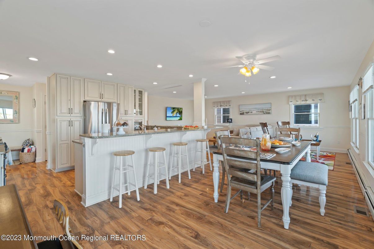 Dining room, Interior, Kitchen, Recessed Lighting, Stainless Steel Appliances, Wood Texture Flooring