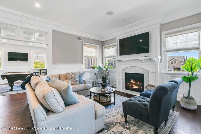 Billiard Table, Fireplace, Game Room, Interior, Living room, Recessed Lighting, Wood Texture Flooring