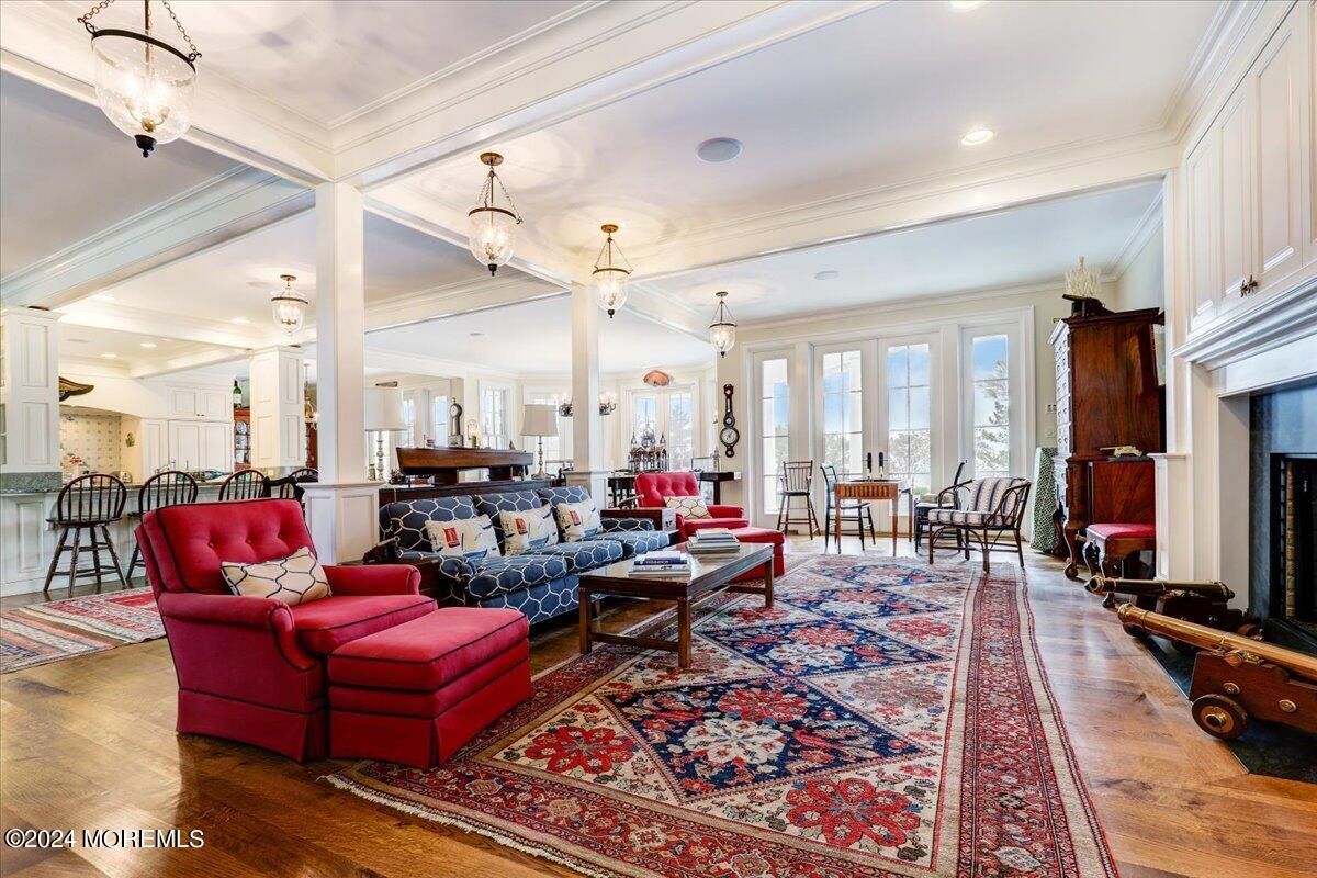 Dining room, Fireplace, Interior, Living room, Pendant Lights, Recessed Lighting, Wood Texture Flooring