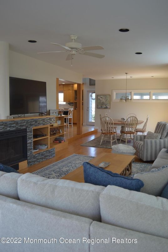 Dining room, Fireplace, Interior, Kitchen, Living room, Pendant Lights, Wood Texture Flooring
