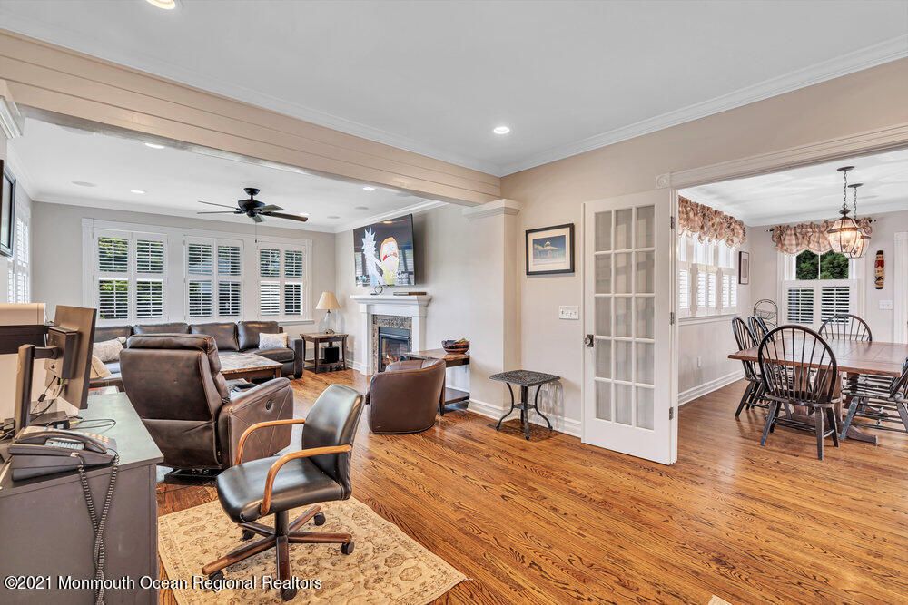 Chandelier, Dining room, Fireplace, Interior, Living room, Recessed Lighting, Wood Texture Flooring