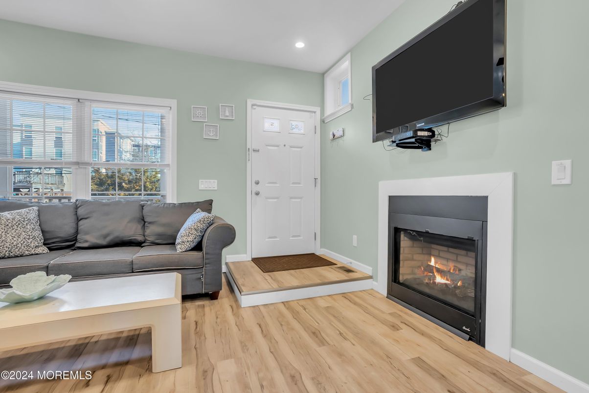 Fireplace, Interior, Living room, Recessed Lighting, Wood Texture Flooring