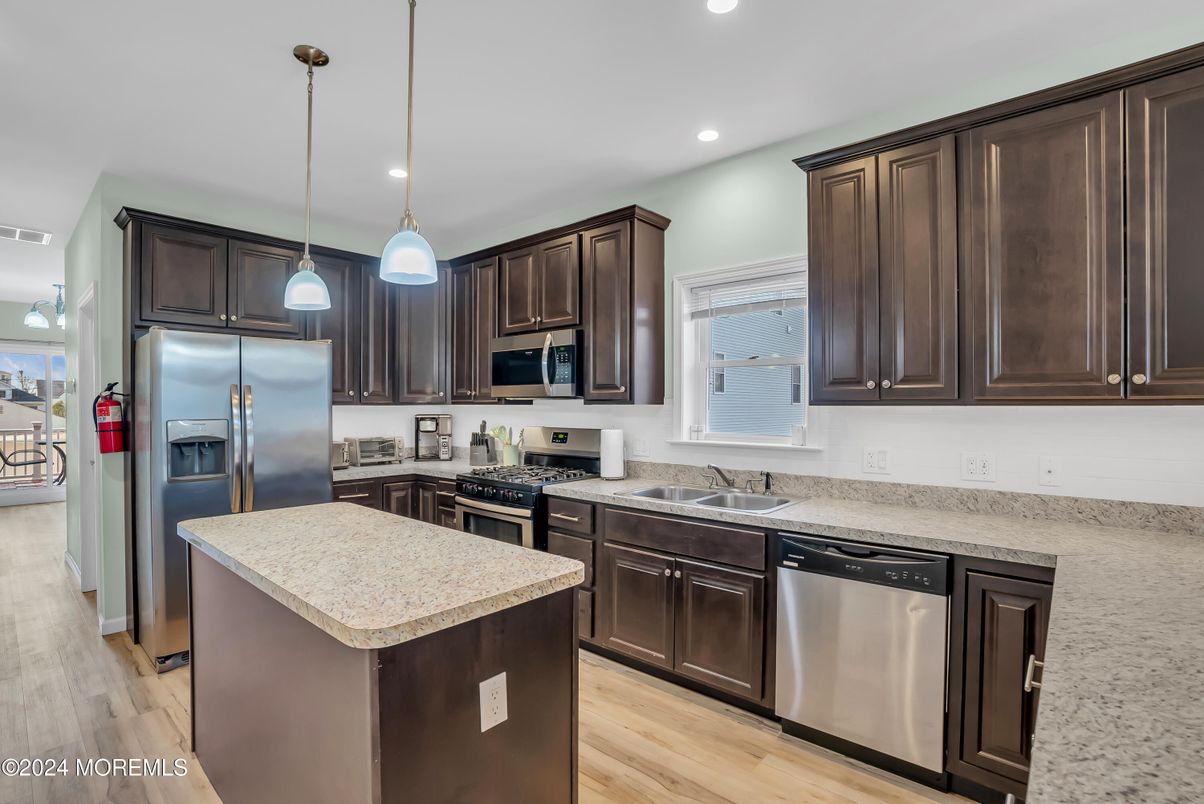 Interior, Kitchen, Pendant Lights, Recessed Lighting, Stainless Steel Appliances, Wood Texture Flooring