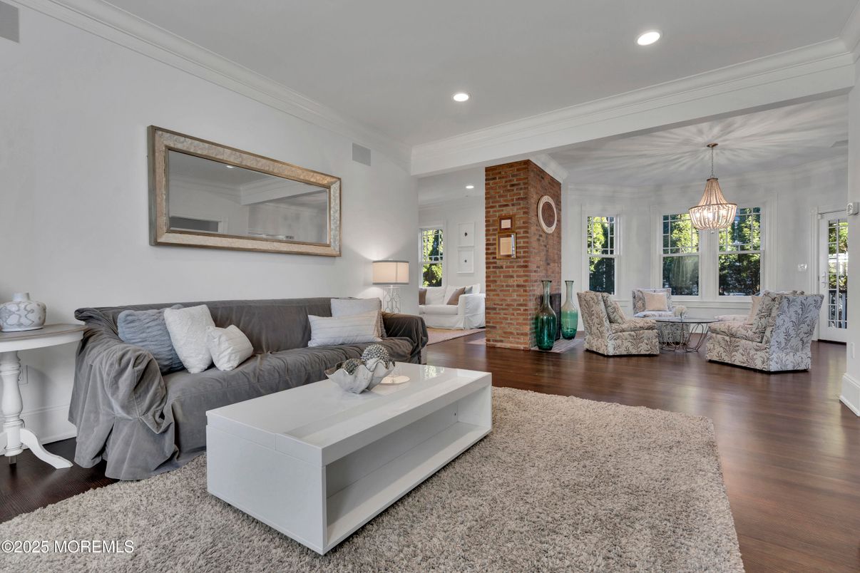 Chandelier, Interior, Living room, Recessed Lighting, Stone Walls, Wood Texture Flooring