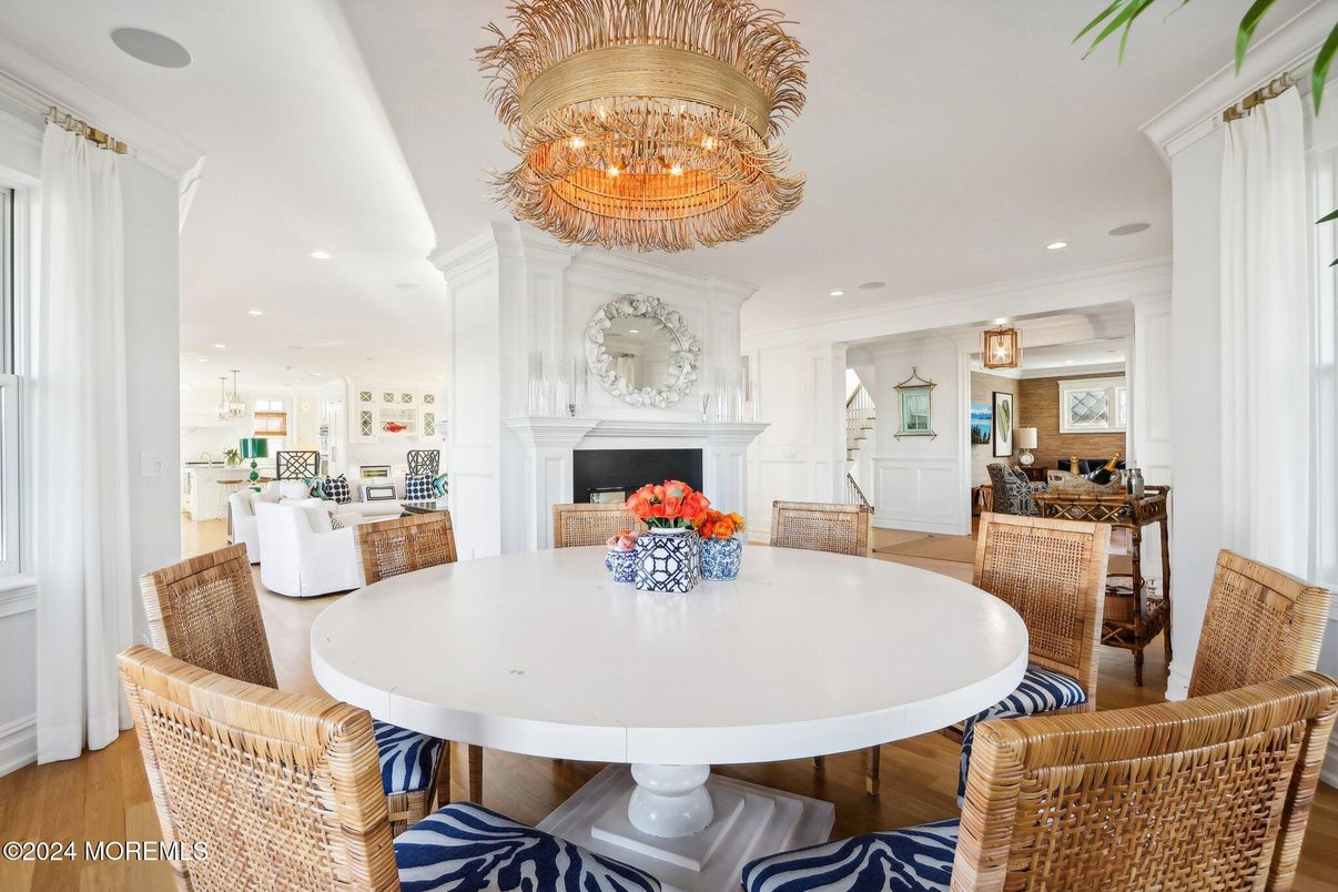 Chandelier, Dining room, Fireplace, Interior, Living room, Recessed Lighting, Wood Texture Flooring