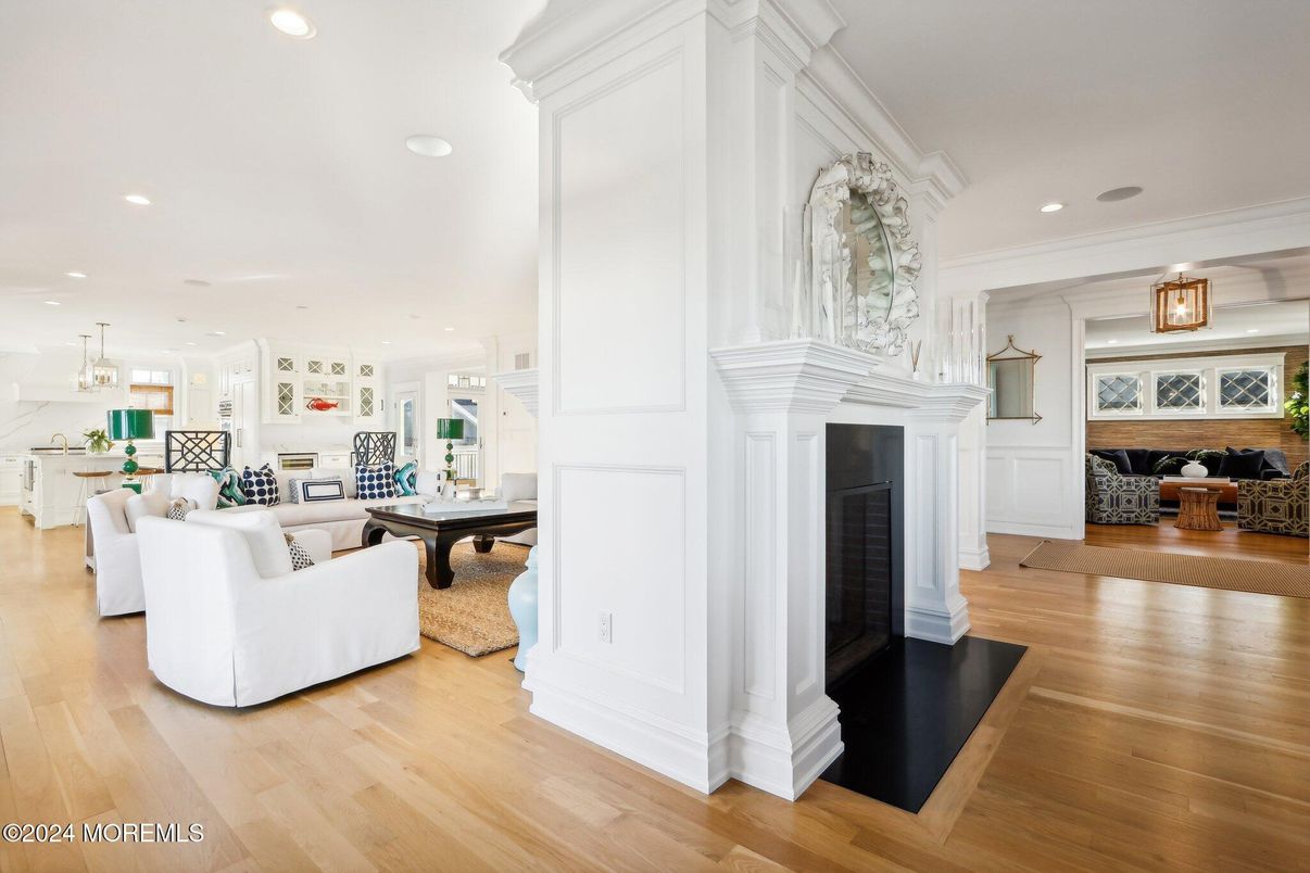Dining room, Fireplace, Interior, Living room, Pendant Lights, Recessed Lighting, Wood Texture Flooring
