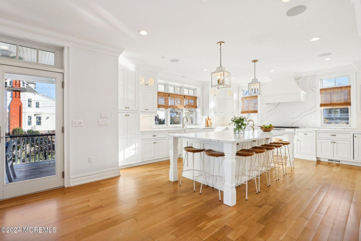 Interior, Kitchen, Marble Walls, Pendant Lights, Recessed Lighting, Wood Texture Flooring