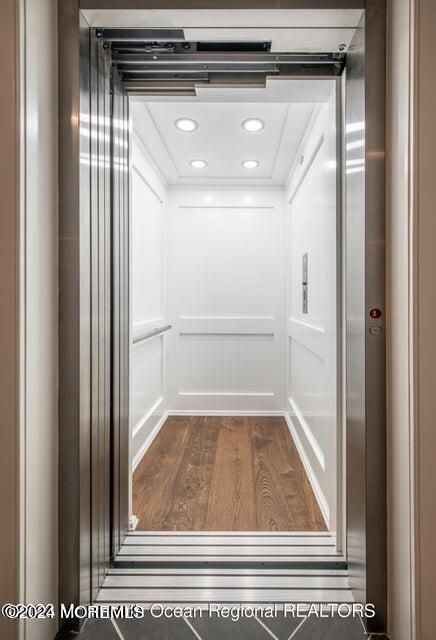 Elevator, Interior, Recessed Lighting, Wood Texture Flooring