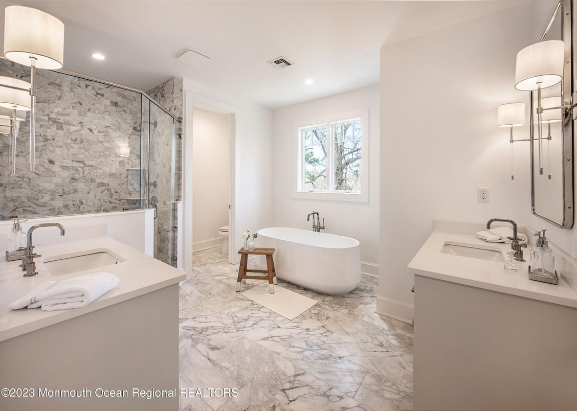 Bathroom, Dual Sink Vanities, Free Standing Baths, Glass Shower, Interior, Marble, Marble Walls, Recessed Lighting