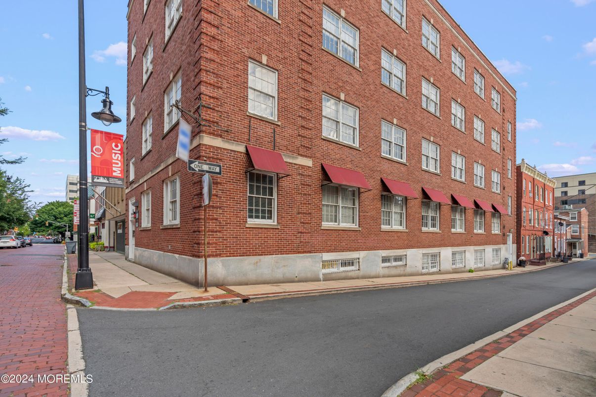 Exterior, Facade, Brick Facade, Condo Building