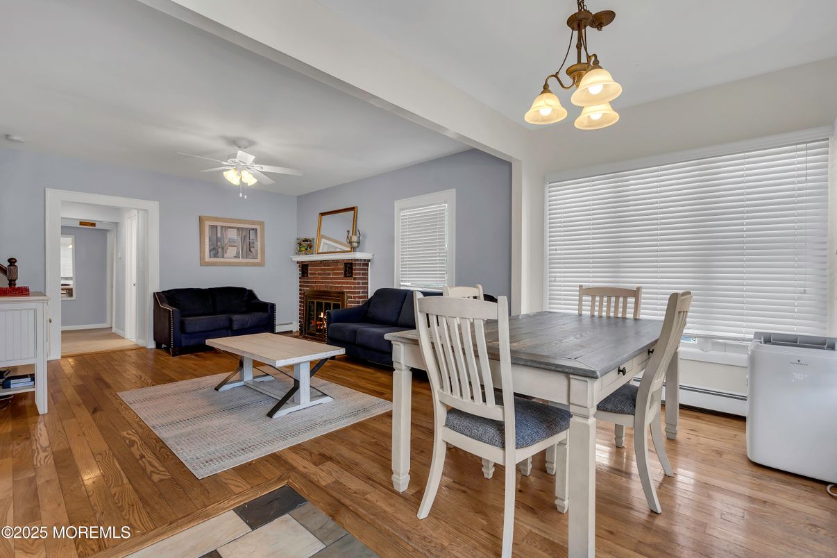 Dining room, Fireplace, Interior, Living room, Pendant Lights, Wood Texture Flooring