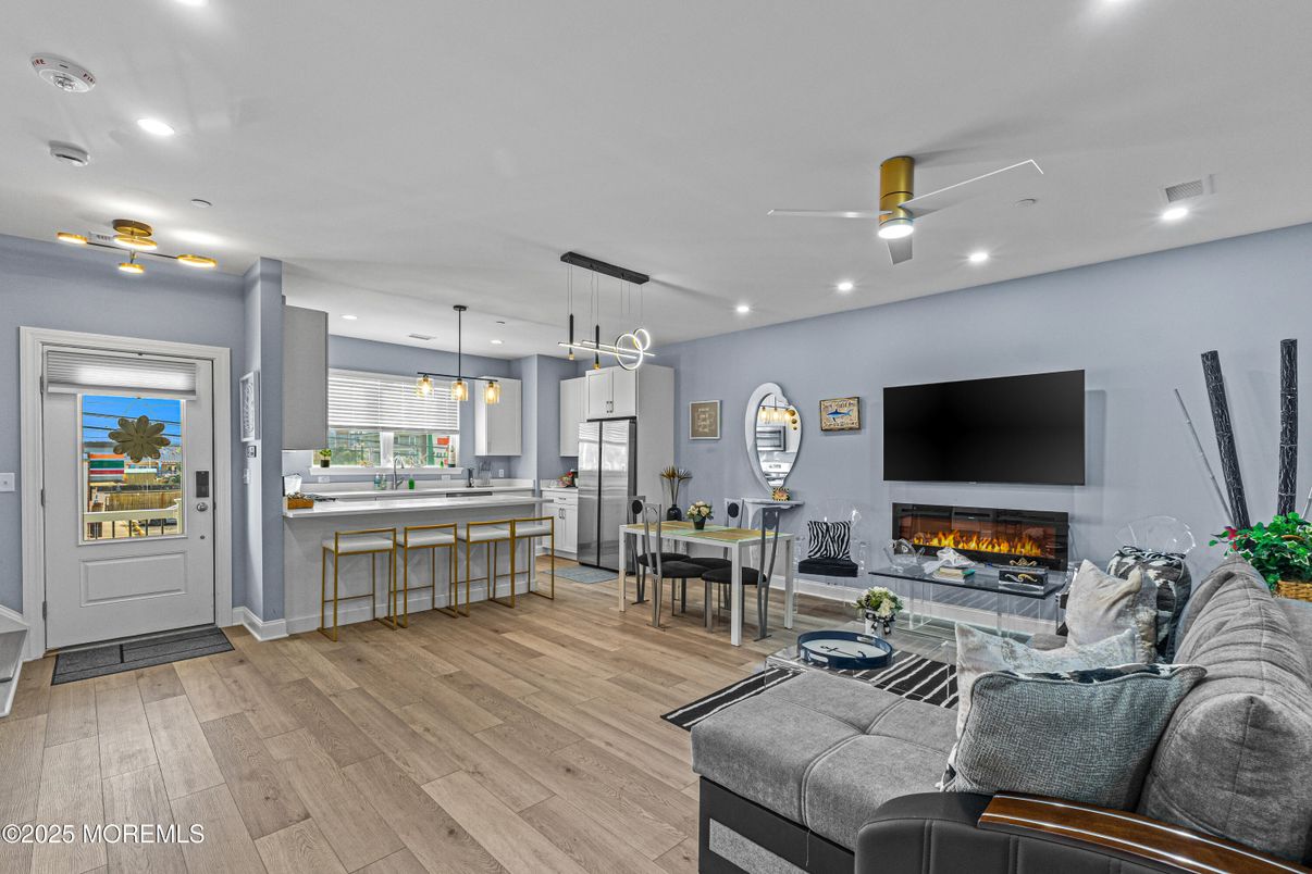 Dining room, Fireplace, Interior, Kitchen, Living room, Pendant Lights, Recessed Lighting, Wood Texture Flooring