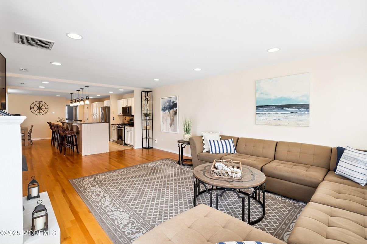 Dining room, Interior, Kitchen, Living room, Pendant Lights, Recessed Lighting, Stainless Steel Appliances, Wood Texture Flooring