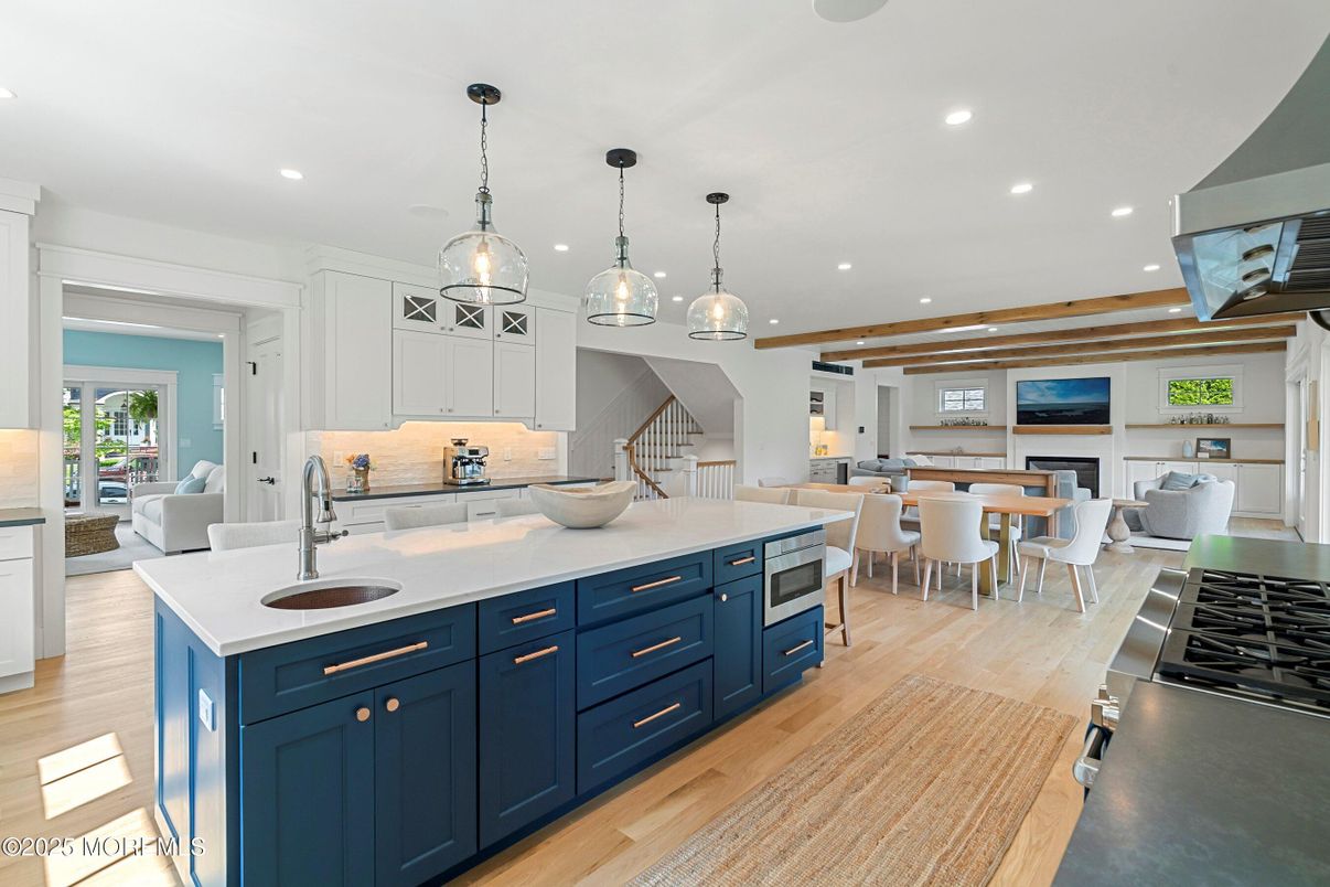 Dining room, Fireplace, Interior, Kitchen, Living room, Pendant Lights, Recessed Lighting, Wooden Beams, Wood Texture Flooring