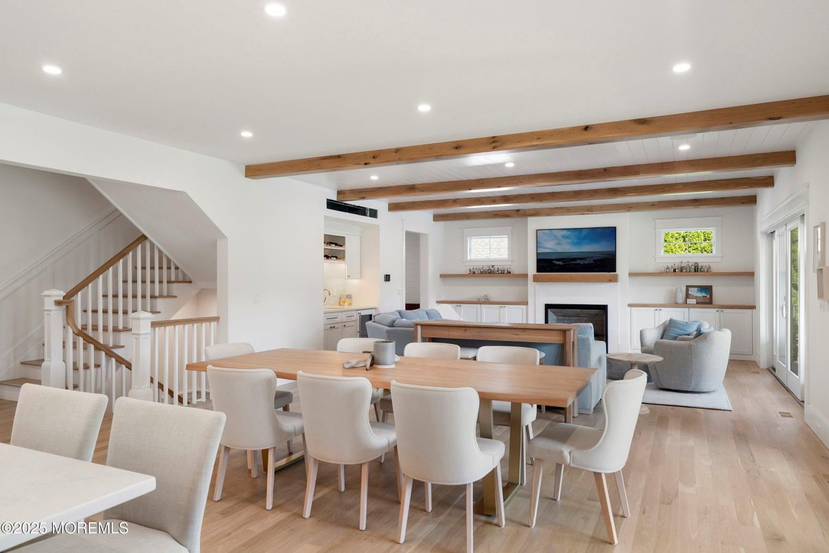 Dining room, Fireplace, Interior, Living room, Recessed Lighting, Wooden Beams, Wood Texture Flooring