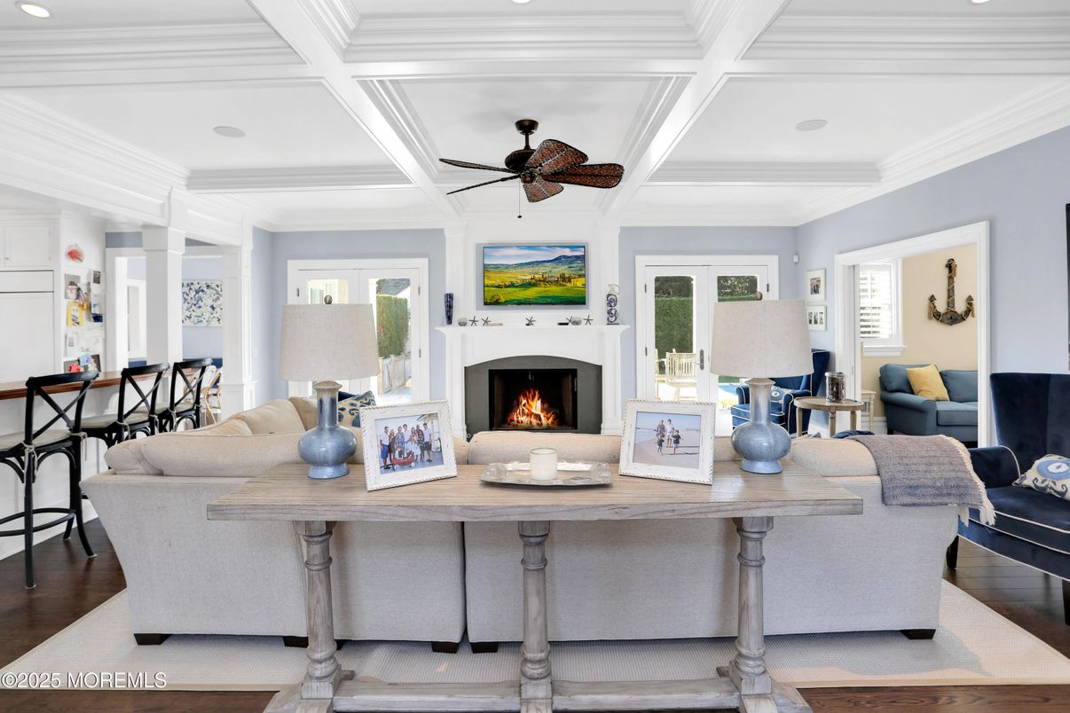 Dining room, Fireplace, Interior, Living room, Recessed Lighting, Wood Texture Flooring