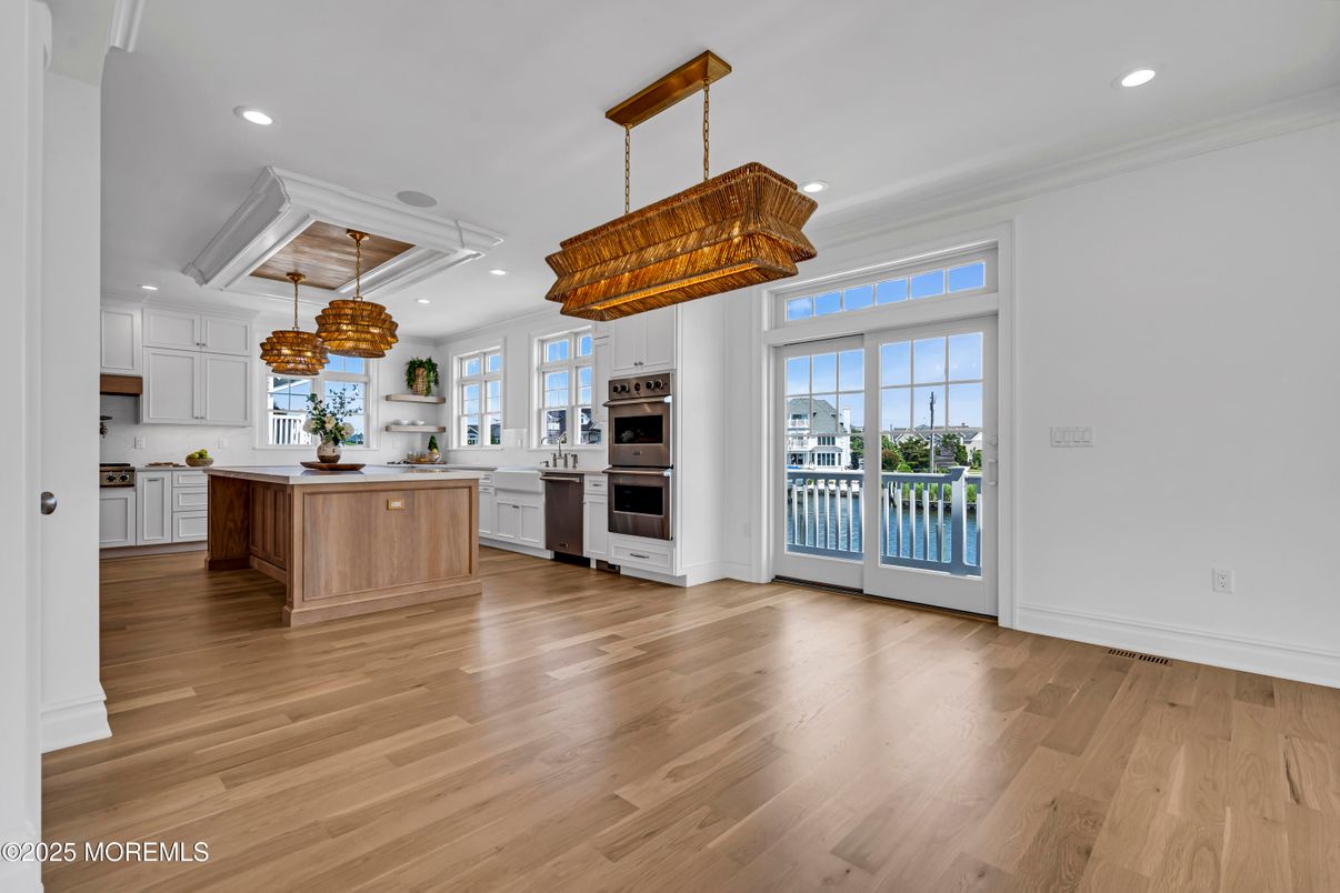 Chandelier, Interior, Kitchen, Pendant Lights, Recessed Lighting, Stainless Steel Appliances, Wood Texture Flooring