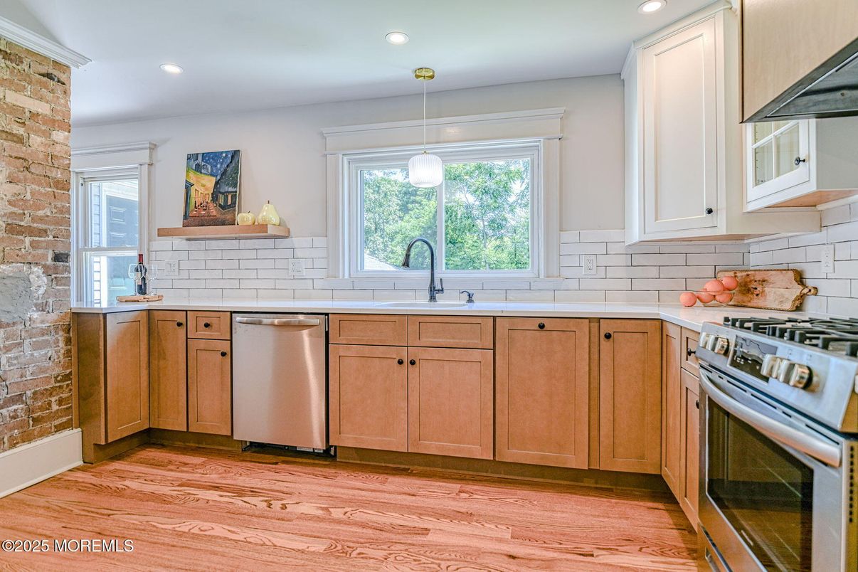 Interior, Kitchen, Pendant Lights, Recessed Lighting, Stainless Steel Appliances, Stone Walls, Wood Texture Flooring