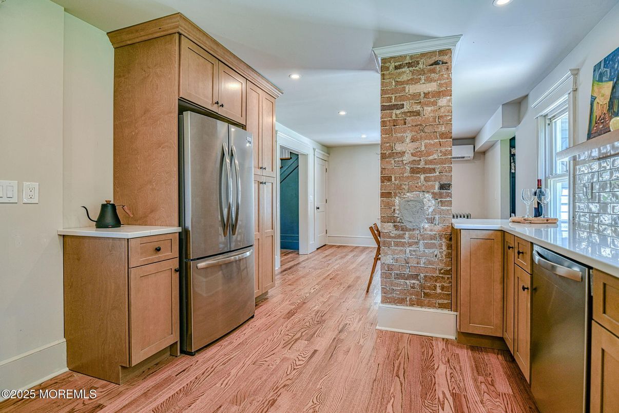 Interior, Kitchen, Recessed Lighting, Stainless Steel Appliances, Stone Walls, Wood Texture Flooring