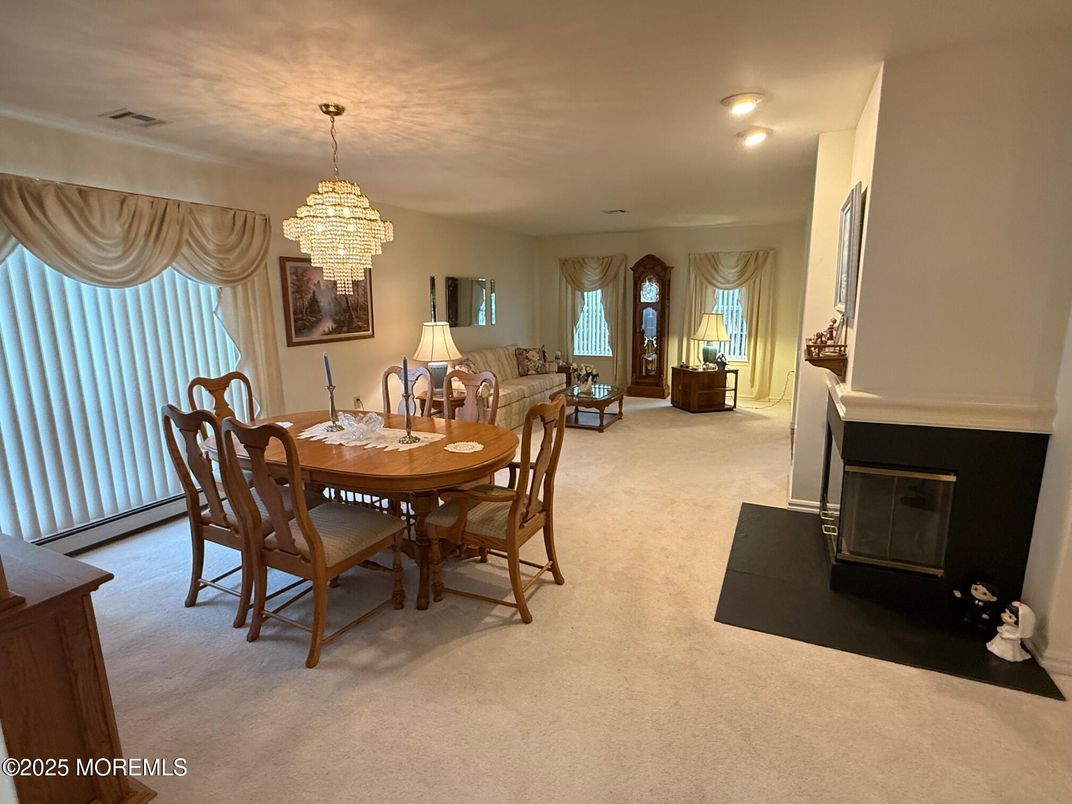 Chandelier, Dining room, Fireplace, Interior, Living room