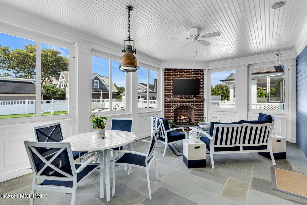 Dining room, Fireplace, Interior, Living room, Pendant Lights, Stone Walls, Sun Room