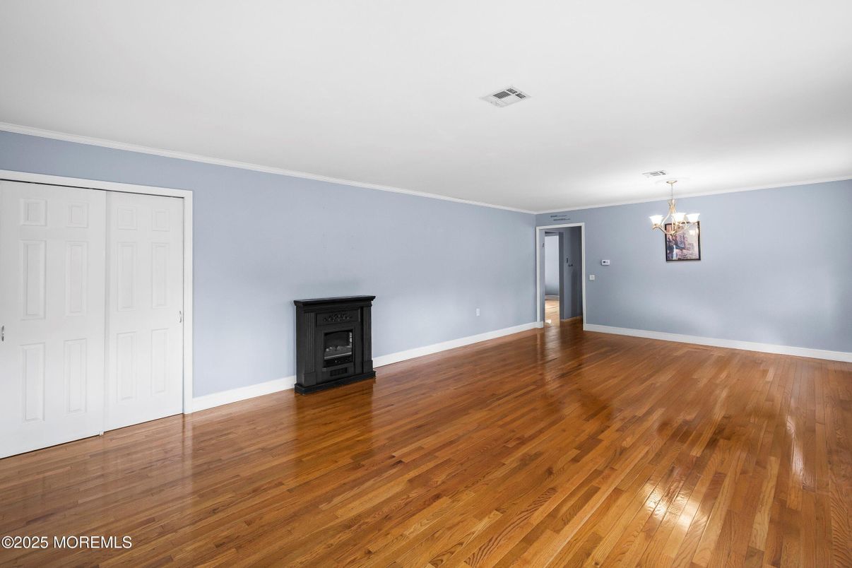 Chandelier, Empty room, Fireplace, Interior, Wood Texture Flooring