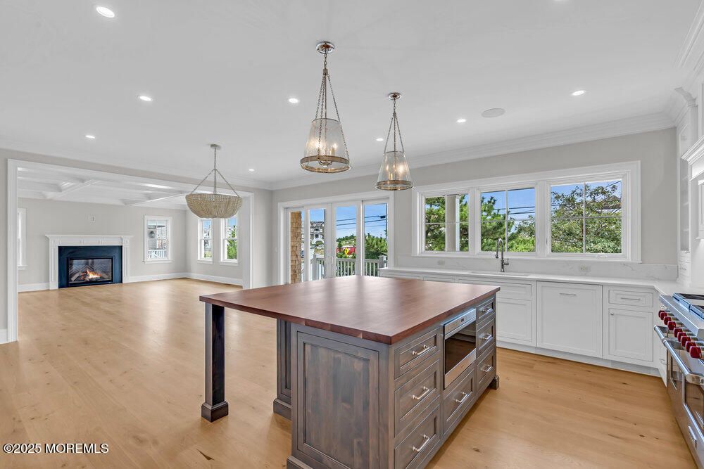 Fireplace, Interior, Kitchen, Pendant Lights, Recessed Lighting, Wood Texture Flooring