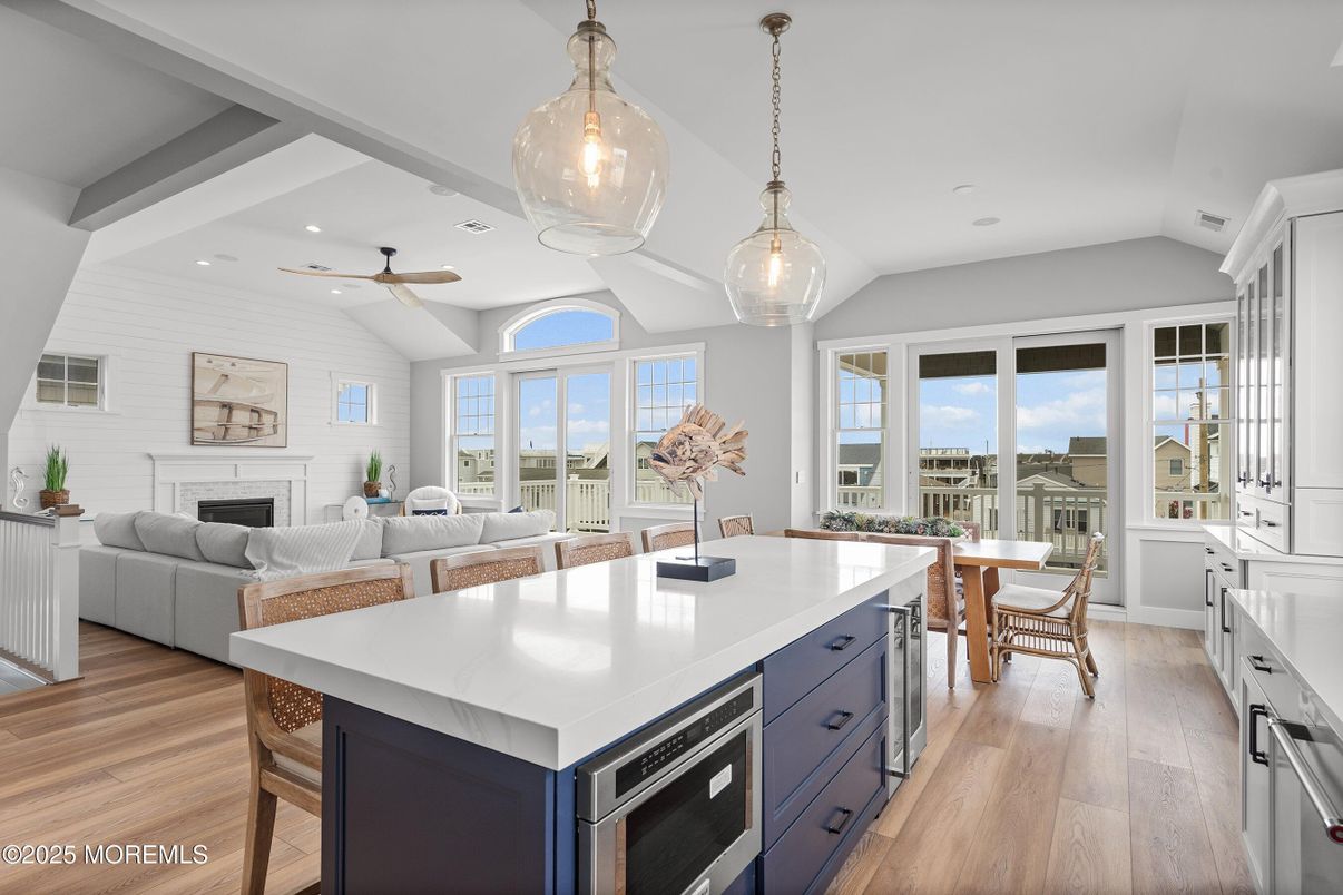Dining room, Fireplace, Interior, Kitchen, Living room, Pendant Lights, Recessed Lighting, Wood Texture Flooring