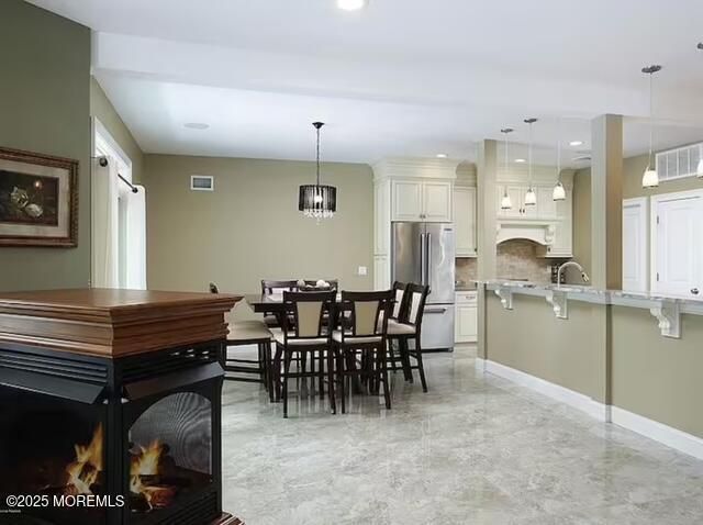 Dining room, Interior, Kitchen, Marble, Pendant Lights, Recessed Lighting, Stainless Steel Appliances