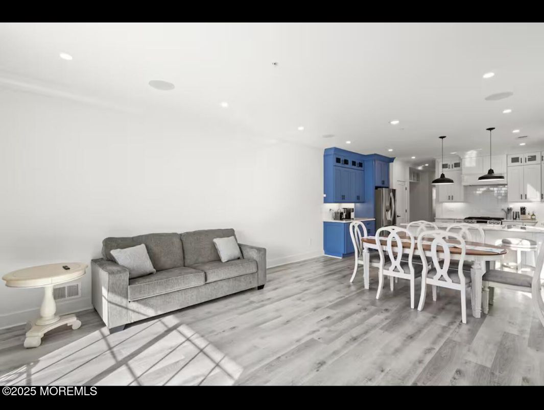 Dining room, Interior, Kitchen, Pendant Lights, Recessed Lighting, Stainless Steel Appliances, Wood Texture Flooring