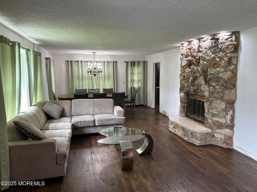 Chandelier, Dining room, Fireplace, Interior, Living room, Wood Texture Flooring