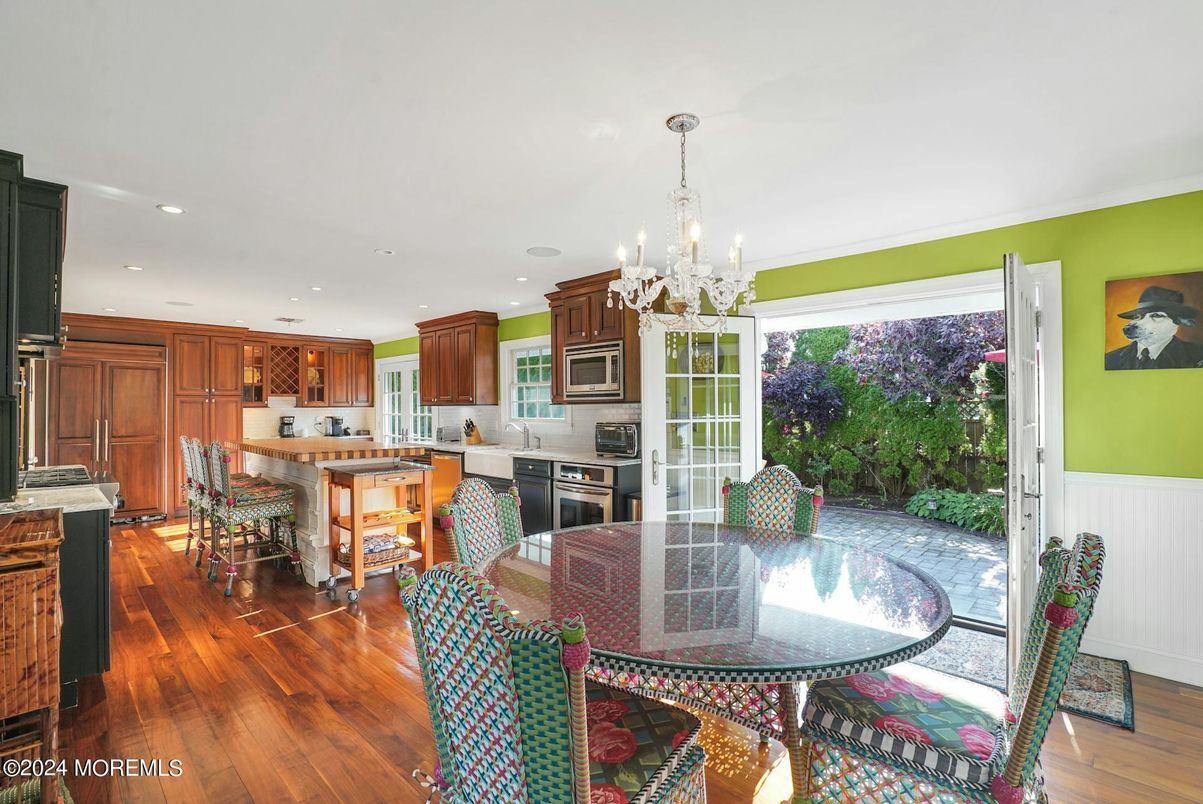 Chandelier, Dining room, Interior, Kitchen, Recessed Lighting, Stainless Steel Appliances, Wood Texture Flooring