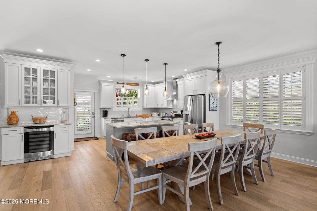 Dining room, Interior, Kitchen, Pendant Lights, Recessed Lighting, Stainless Steel Appliances, Wood Texture Flooring