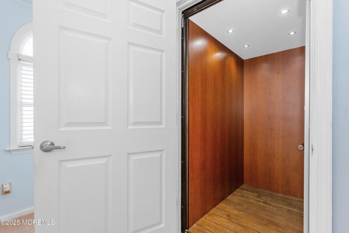 Elevator, Interior, Recessed Lighting, Wood Texture Flooring, Wooden Walls