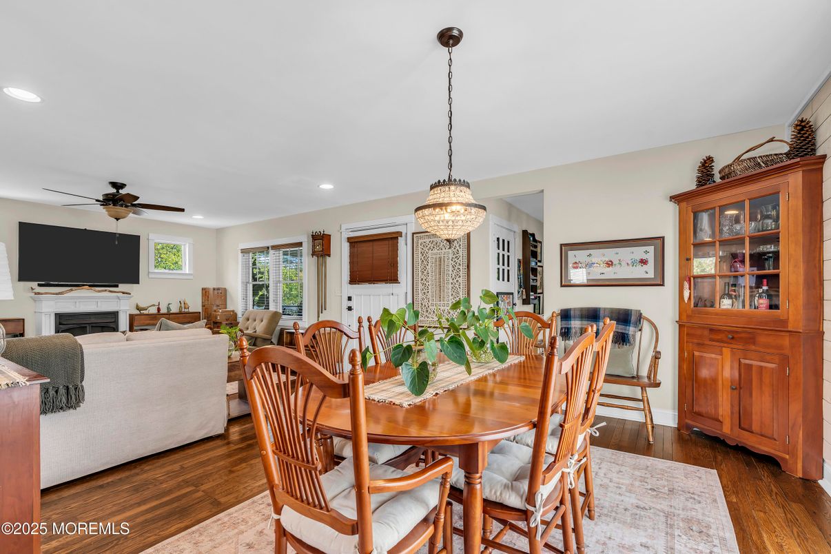 Chandelier, Dining room, Fireplace, Interior, Living room, Recessed Lighting, Wood Texture Flooring