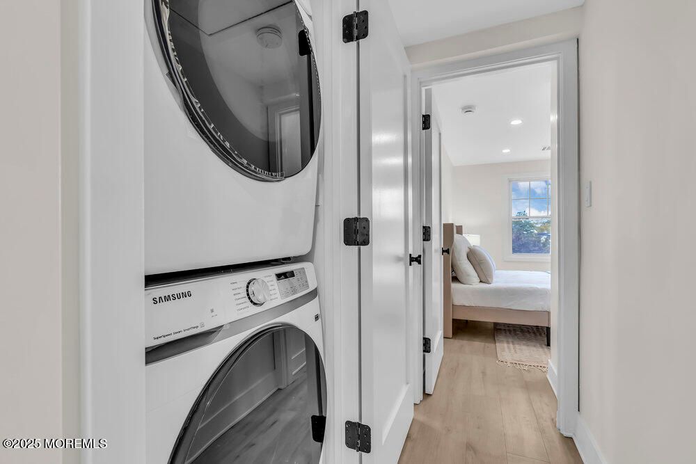 Bedroom, Interior, Recessed Lighting, Utility Closets, Washer, Wood Texture Flooring