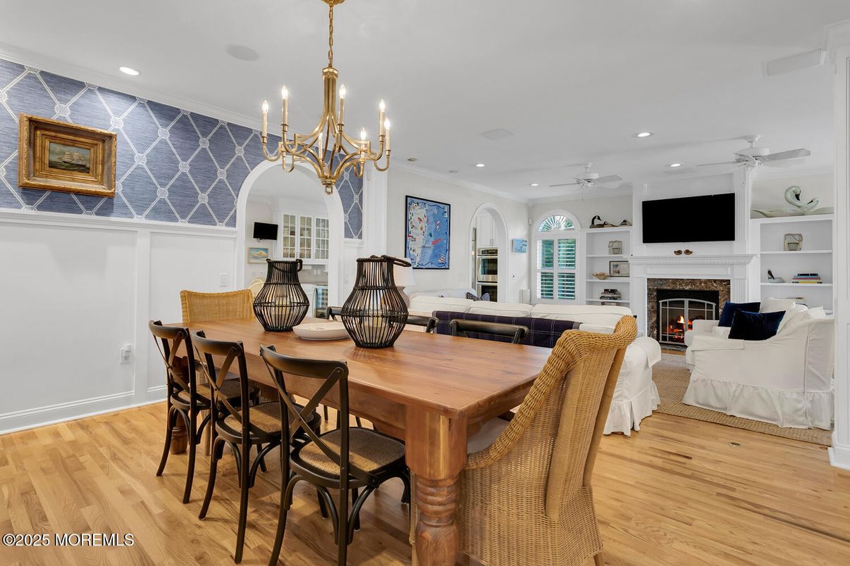 Chandelier, Dining room, Fireplace, Interior, Living room, Recessed Lighting, Wood Texture Flooring