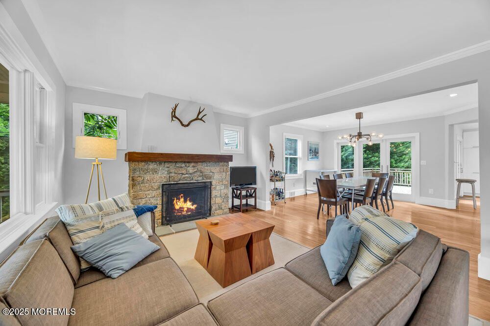 Dining room, Fireplace, Interior, Living room, Pendant Lights, Recessed Lighting, Wood Texture Flooring