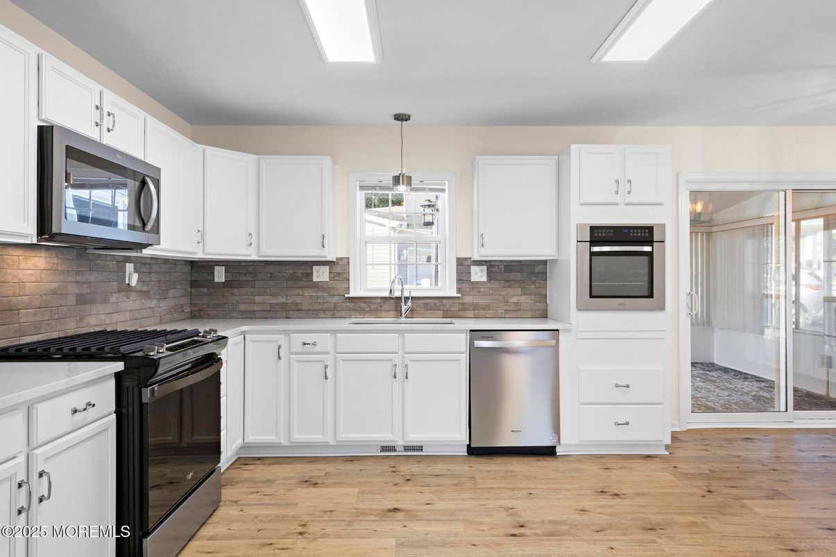 Interior, Kitchen, Pendant Lights, Stainless Steel Appliances, Wood Texture Flooring