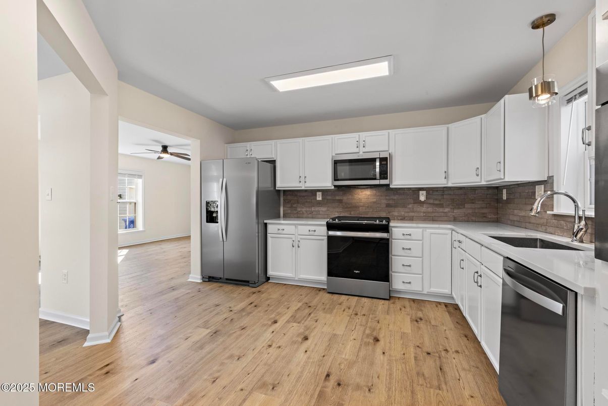 Interior, Kitchen, Pendant Lights, Stainless Steel Appliances, Wood Texture Flooring