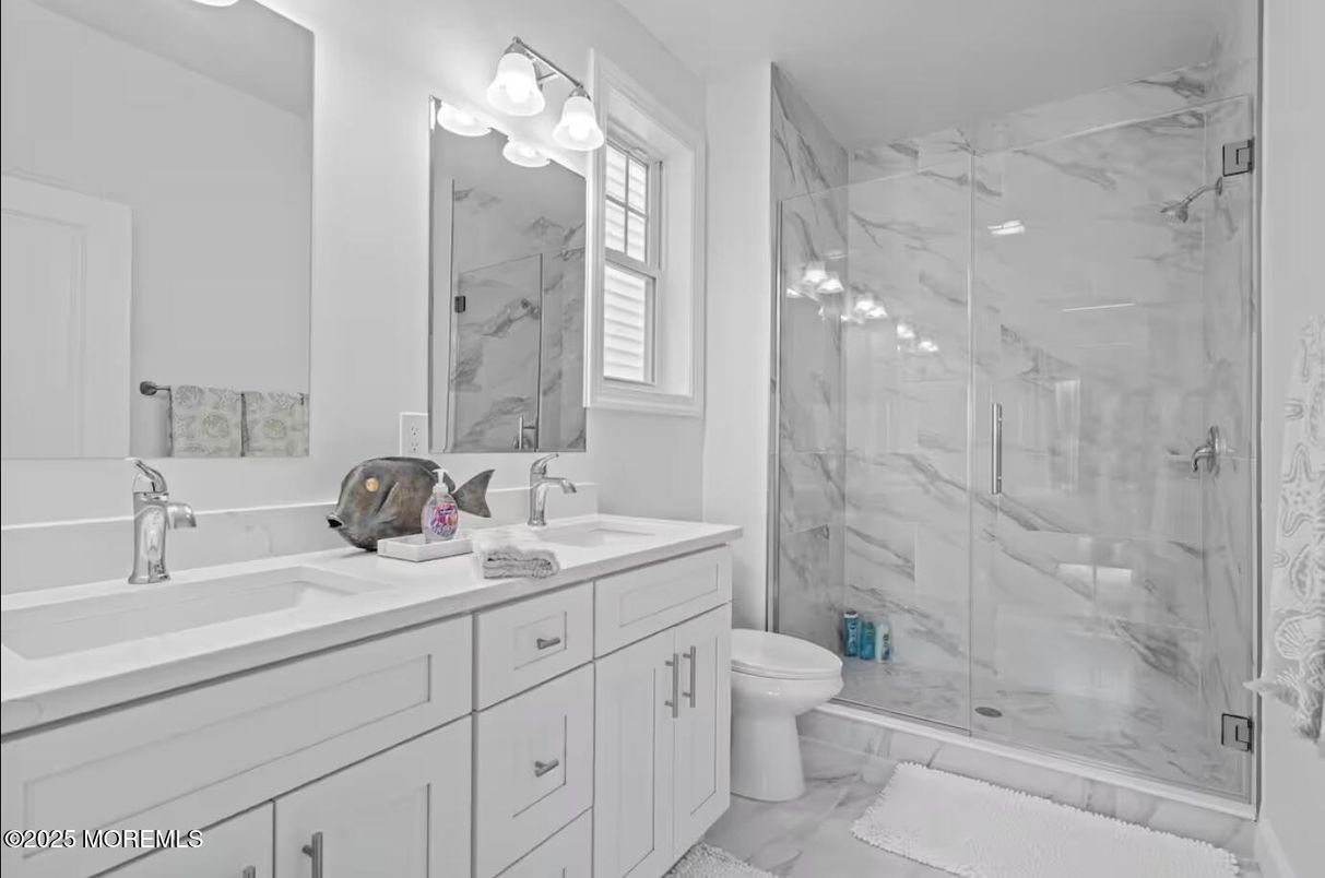 Bathroom, Dual Sink Vanities, Glass Shower, Interior, Marble Walls